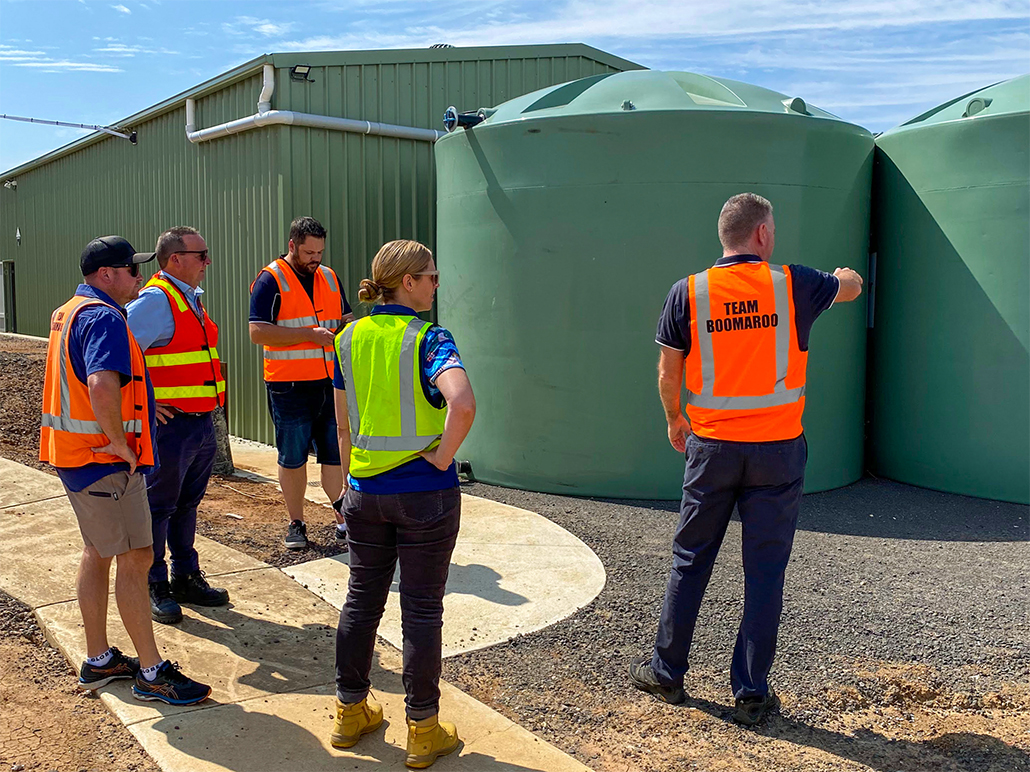 Pictured: Phillip Demark, Peter Smith and Daniel Jacometti from Boomaroo Nurseries show Darren Milverton and Laura Kendall from Barwon Water the new water recycling plant made possible with their grant.