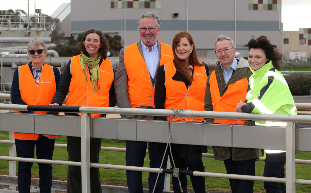 Left to right: Tracey Slatter (Managing Director Barwon Water), Cr Libby Stapleton (Mayor Surf Coast Shire), Cr Ross Ebbels (Mayor Borough of Queenscliffe), Cr Belinda Moloney (City of Greater Geelong), Cr Gavin Gamble (Mayor Golden Plains Shire) and Jo Plummer (Chair of Barwon Water Board on site at the Black Rock water reclamation plant, future home to the Regional Renewable Organics Network.